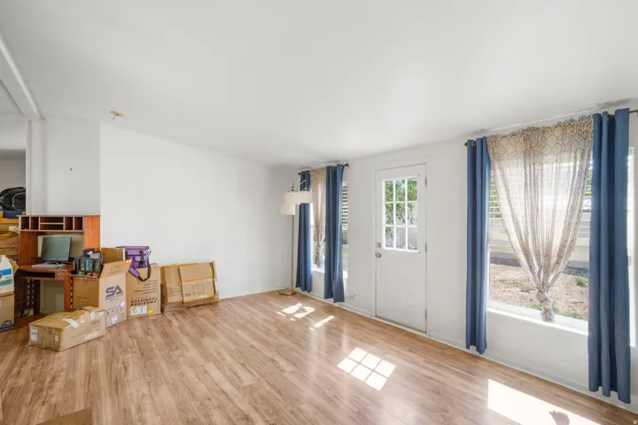 Wood-finish flooring with white walls