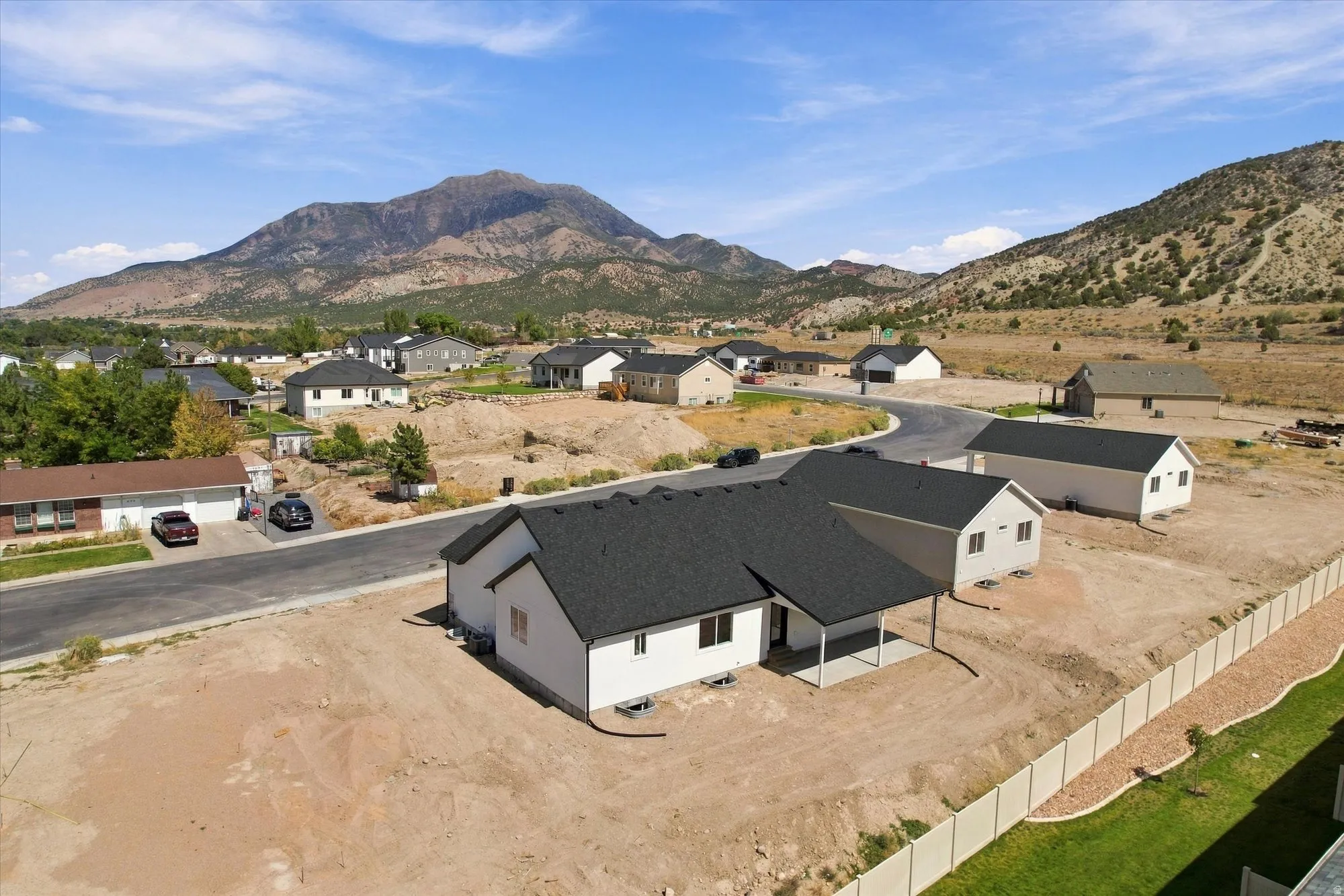Newly constructed single-story residence with a covered patio