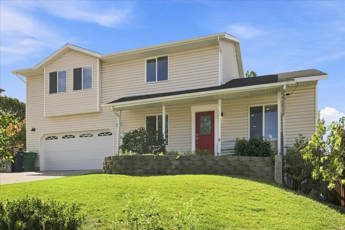 Two-story residence with light-colored siding