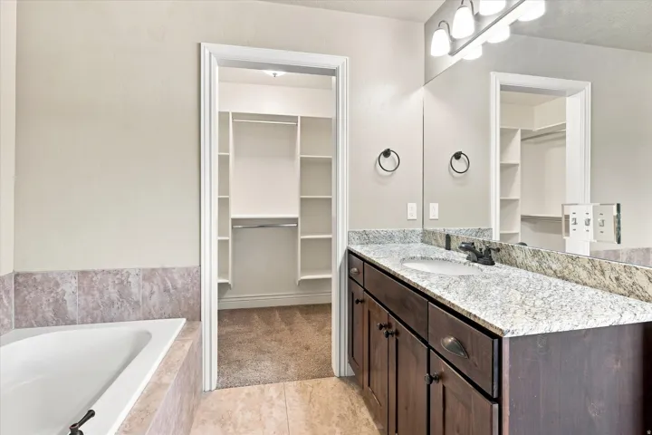 Master Bathroom and Walk in Clostt