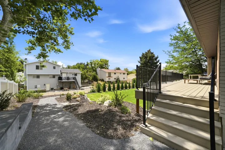 Expansive outdoor deck with black metal railings