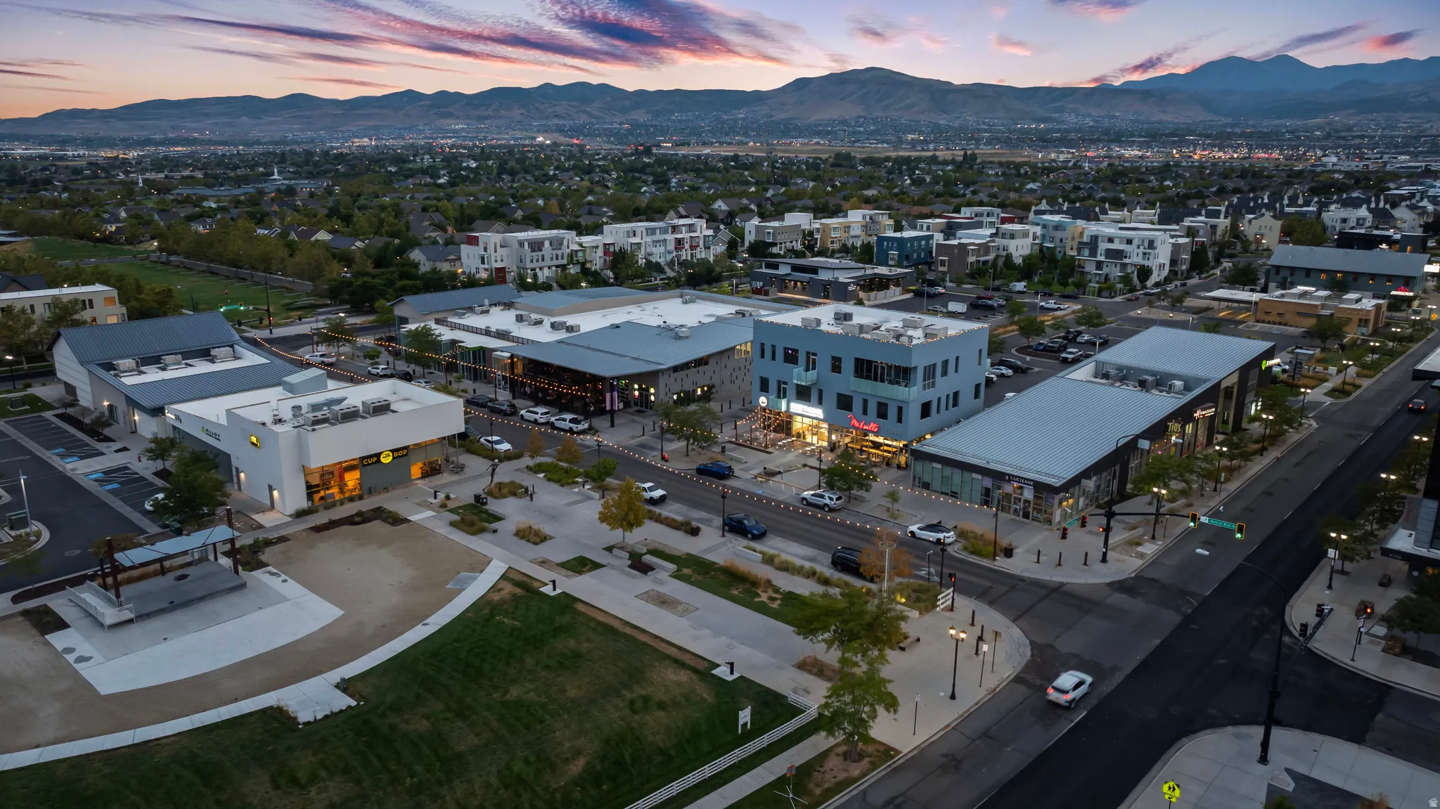 Enjoy all of the retail shops and restaurants nearby, ample street parking, and a structured outdoor gathering area with a stage