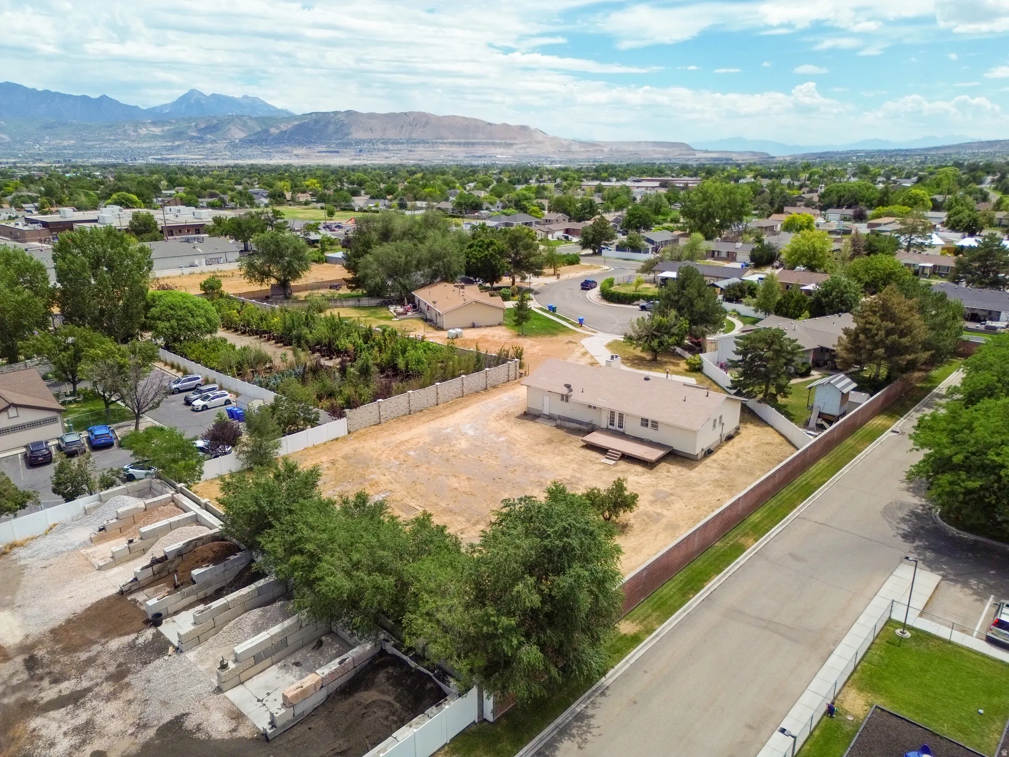 Expansive lot with a single-story residence and a rear deck
