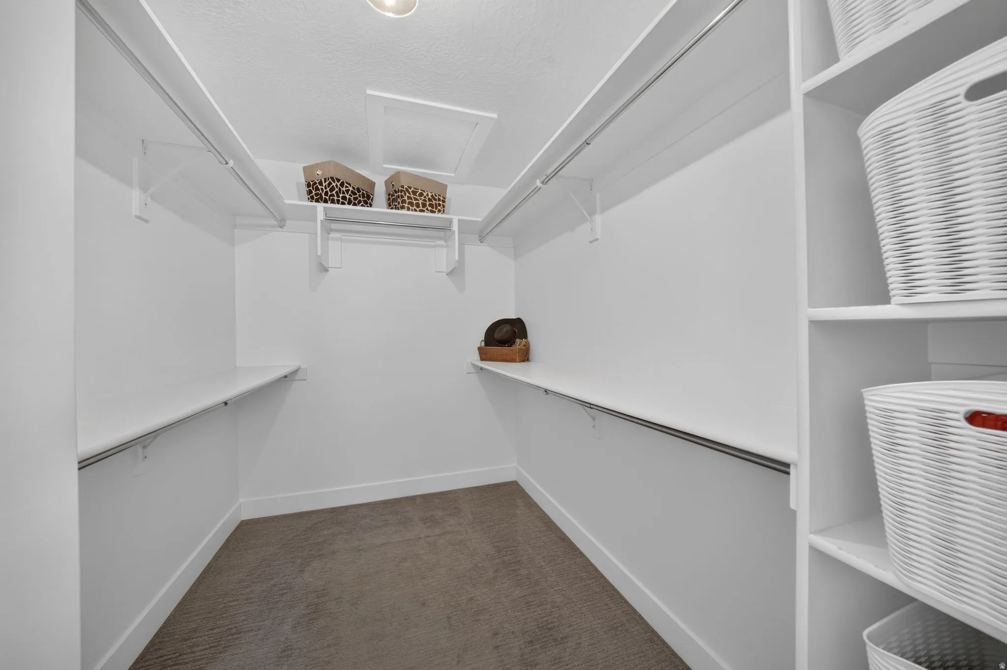 Built-in shelving, hanging rods, and recessed lighting