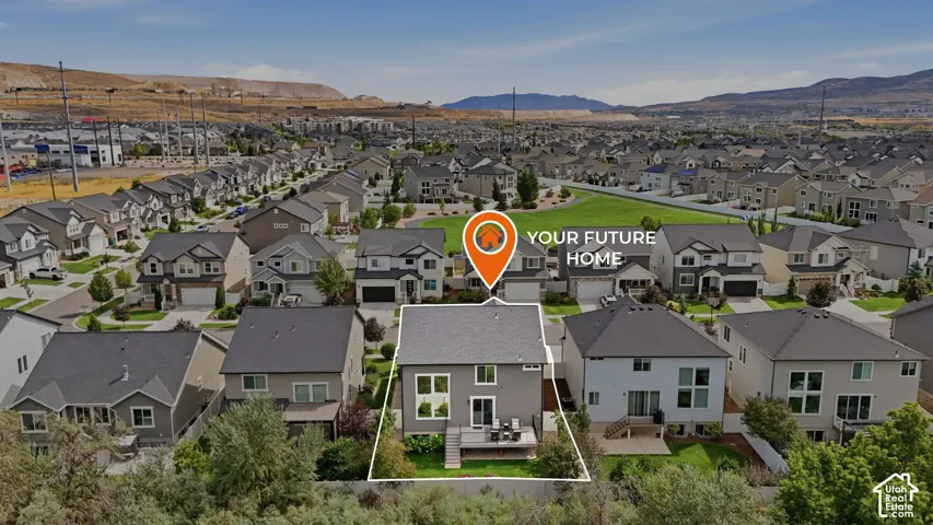 Aerial view of this modern home situated in an established residential community
