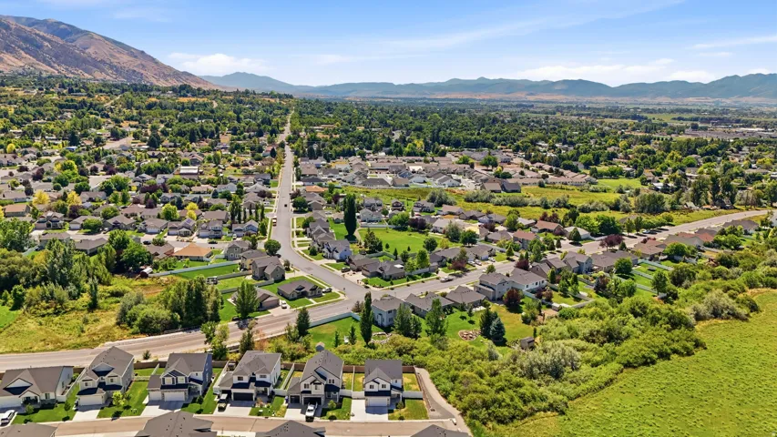 Residential neighborhood with distant mountain ranges and abundant green spaces