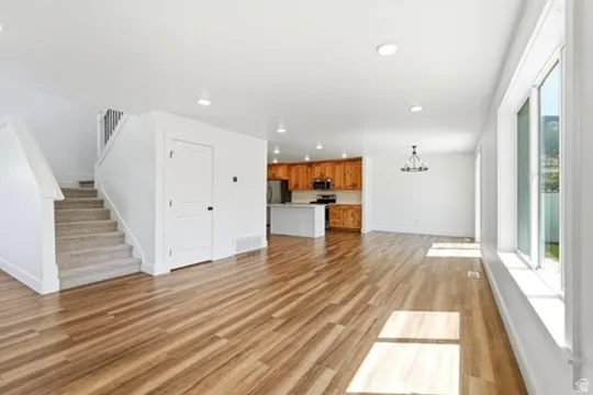 Wood-finish flooring throughout the main level