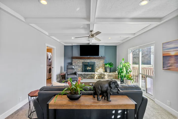 Coffered ceiling with recessed lighting and ceiling fan