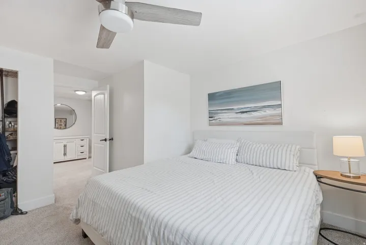 Recessed lighting, ceiling fan, and carpet flooring