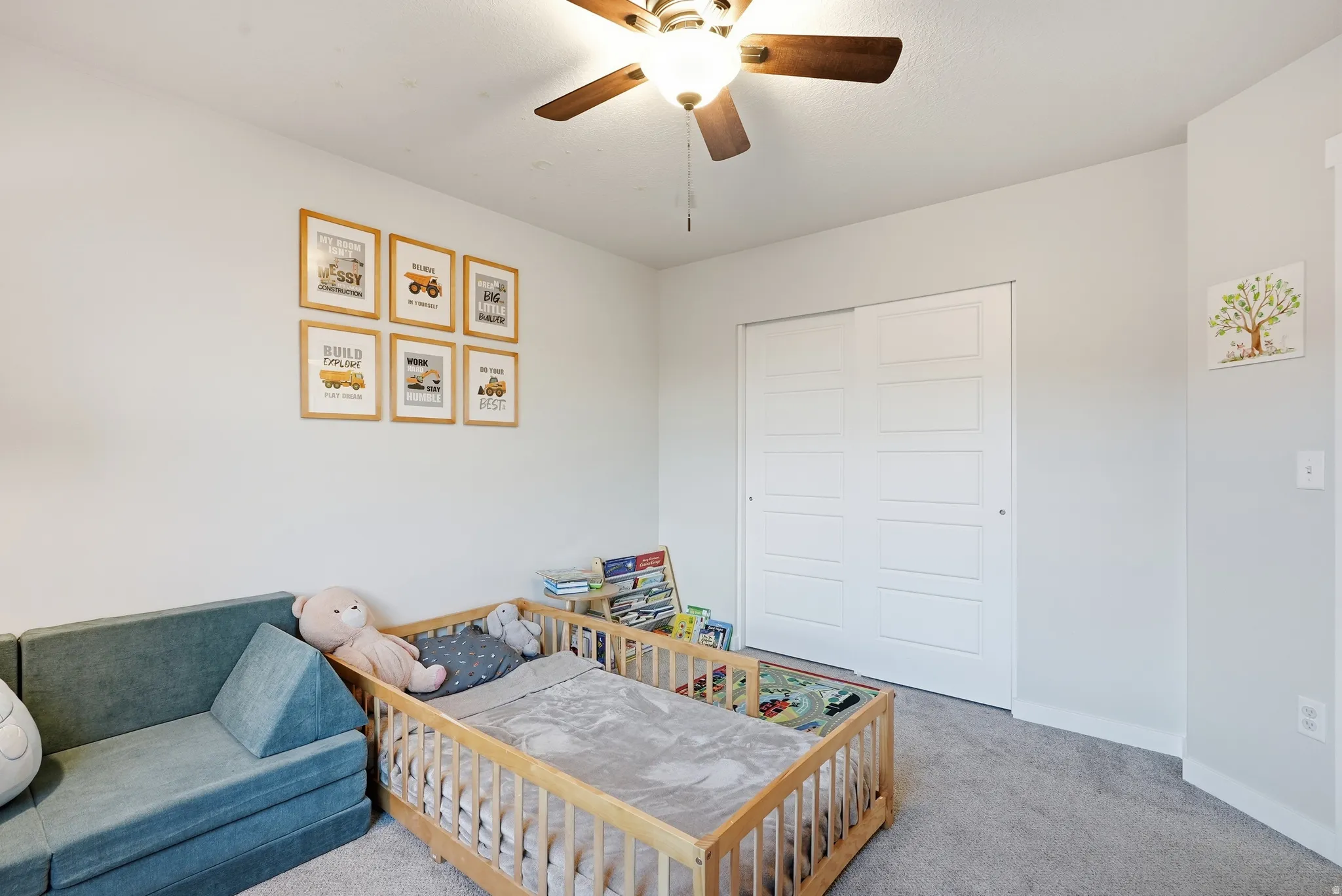 Wall-to-wall carpeting and white walls