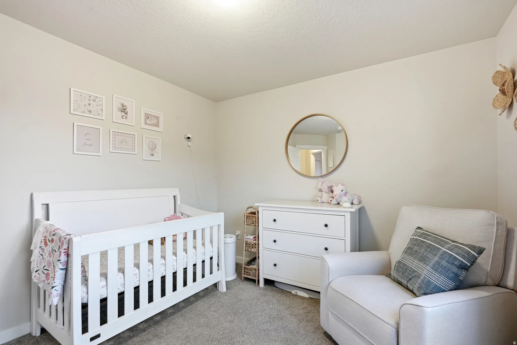Wall-to-wall carpeting and neutral wall tones
