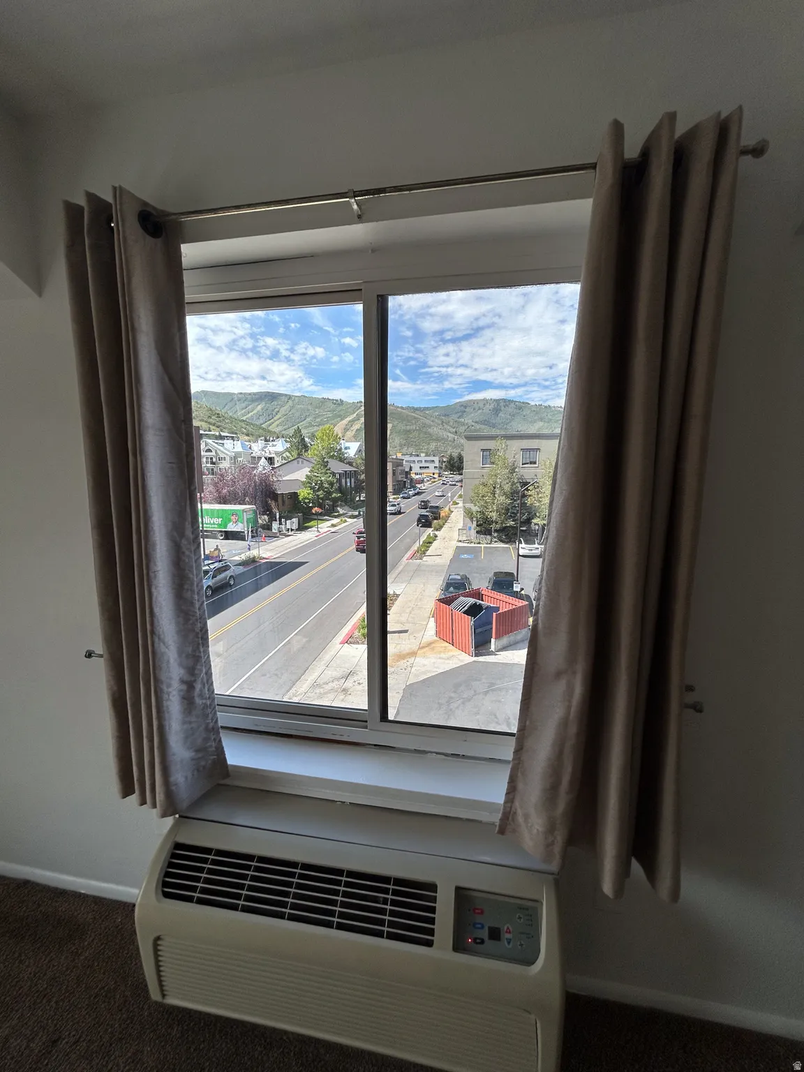 Window with a mountain backdrop