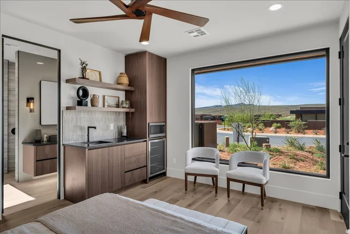 Integrated wet bar with a built-in microwave and beverage cooler