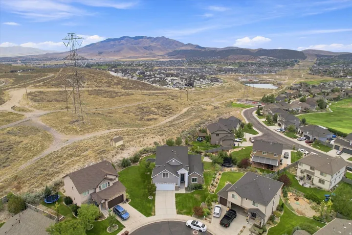 Residential neighborhood with established homes, paved streets, and maintained green spaces