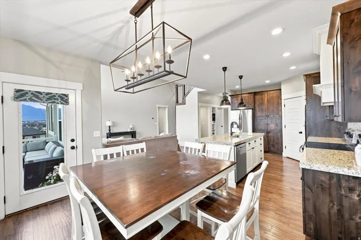 Wood-finish flooring throughout the dining and kitchen areas