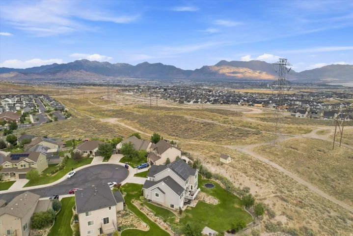 Residential development featuring multiple homes with solar panel installations