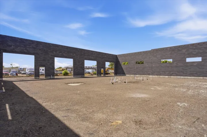 New construction featuring concrete block walls and pre-plumbed floor piping