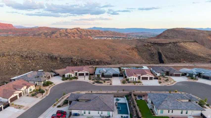 Residential properties with varied rooflines and landscaping