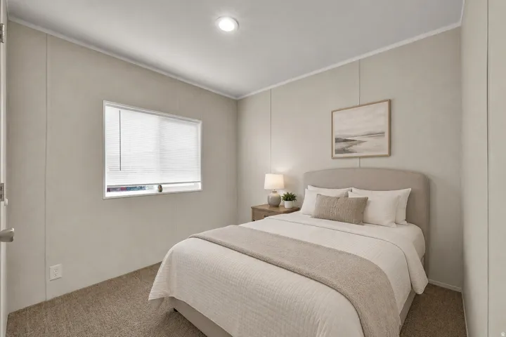 Recessed ceiling lighting, vertical wall paneling, window with blinds, carpeted flooring, and a built-in closet