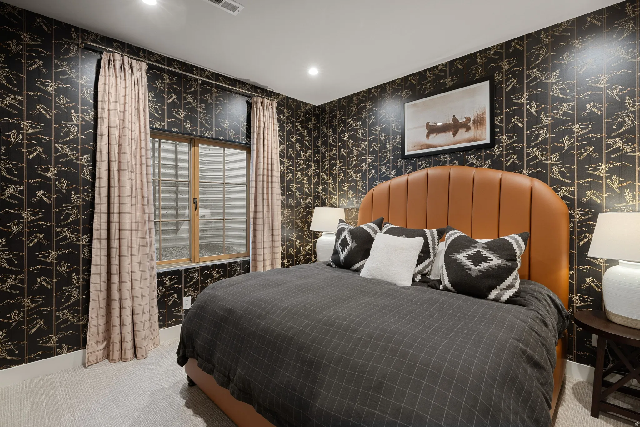 Recessed lighting, patterned wall covering, wood-framed window, and light-toned flooring
