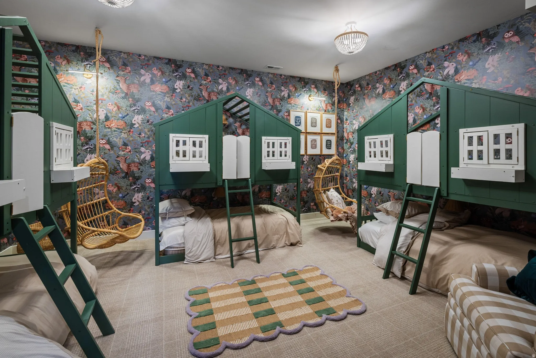 Four built-in bunk beds with ladder access and integrated window details