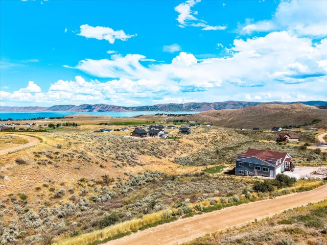 Striking residence set on expansive grounds featuring panoramic vistas of mountains and coastline