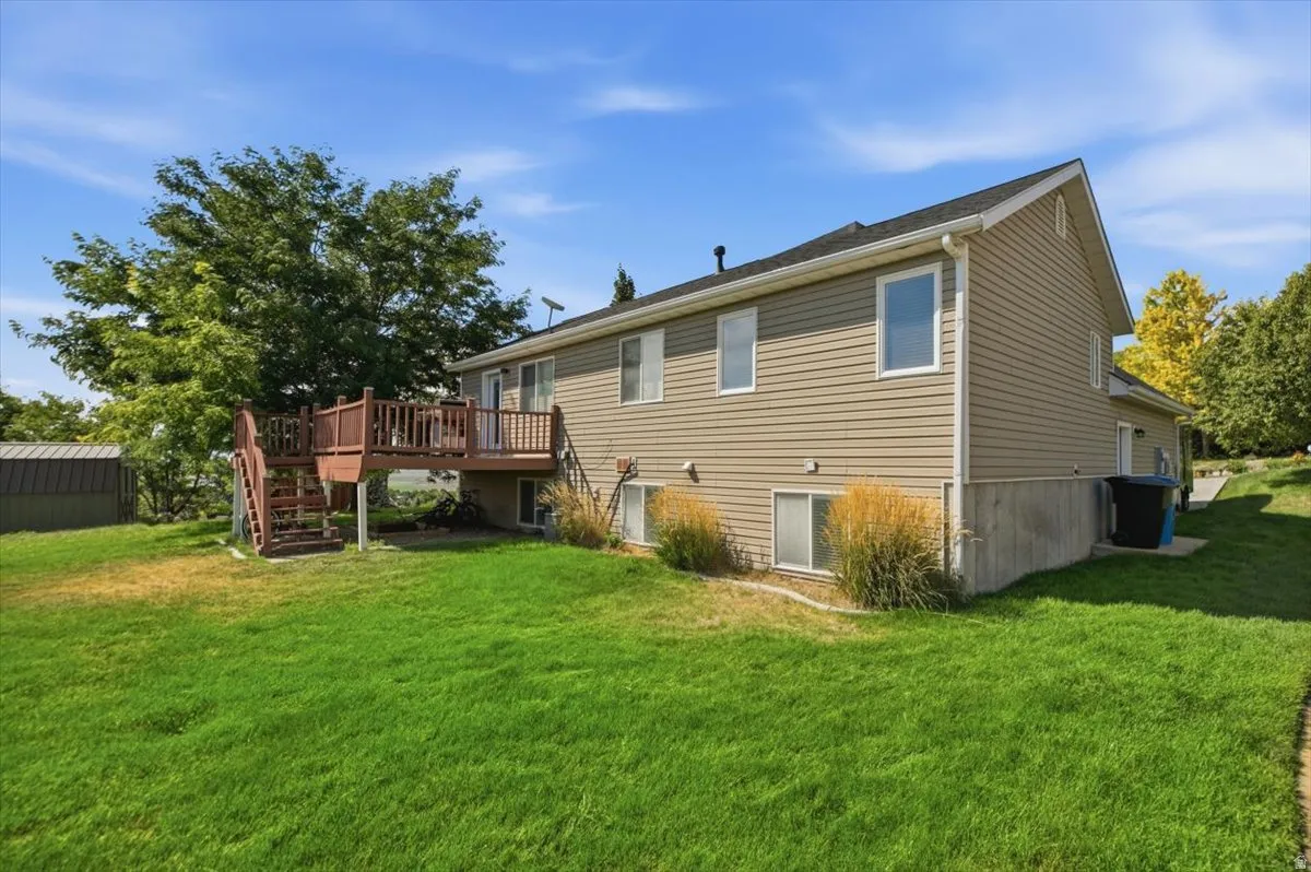 Spacious single-family home with vinyl siding exterior and multiple windows offering natural light