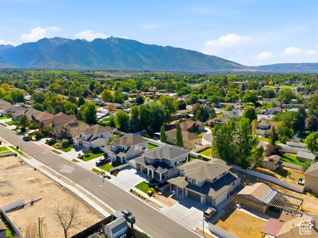 Mountain backdrop with established residential landscaping
