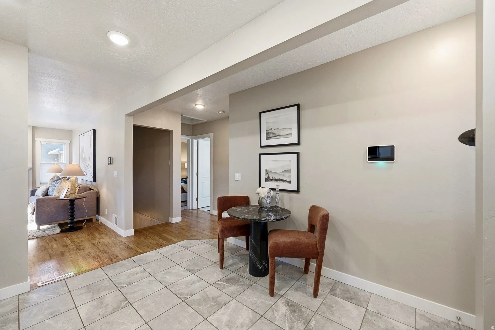 Welcoming foyer featuring tile flooring, recessed ceiling lighting, and neutral wall finishes