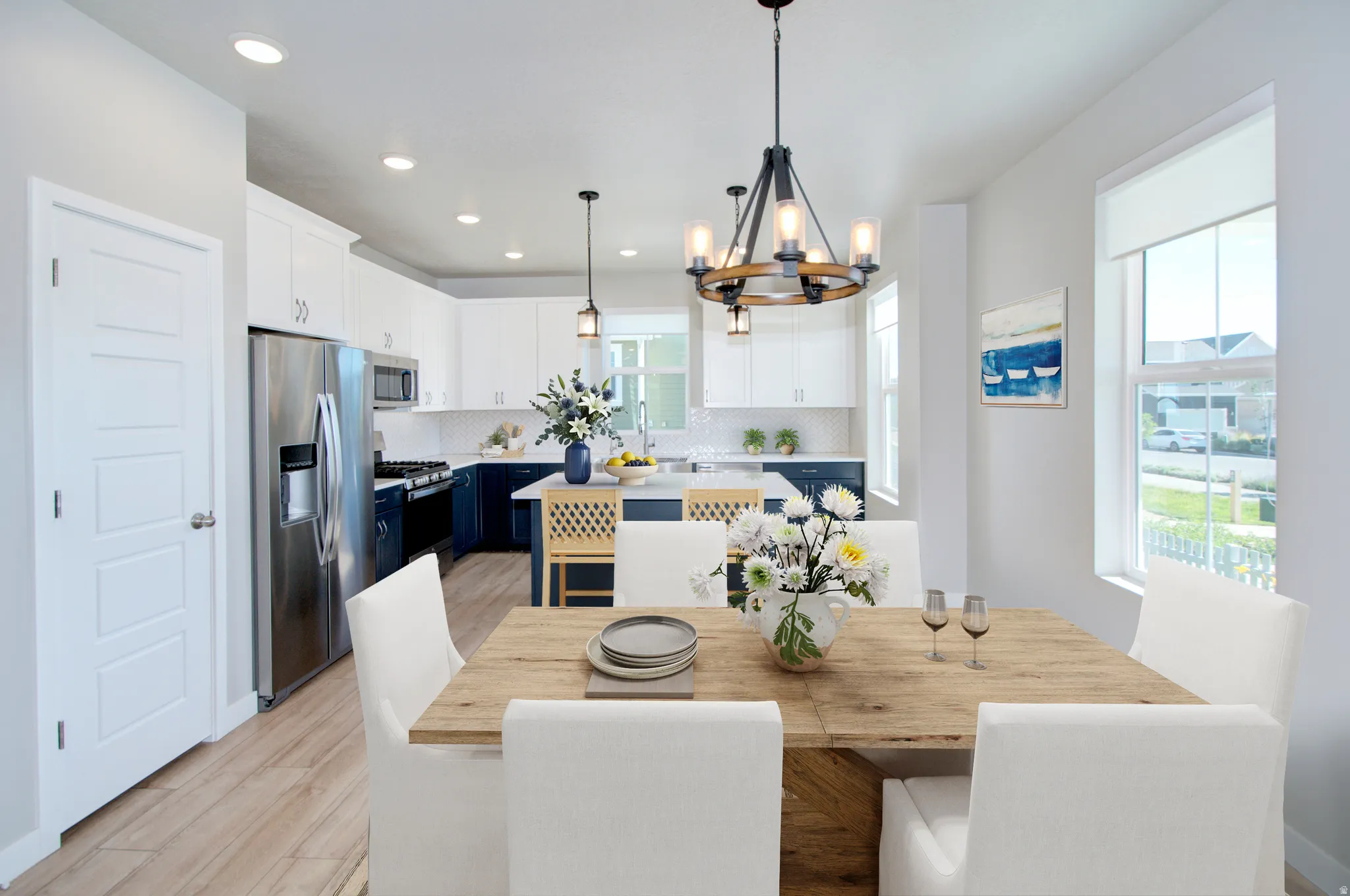 Open-concept living space with wood-finish flooring
