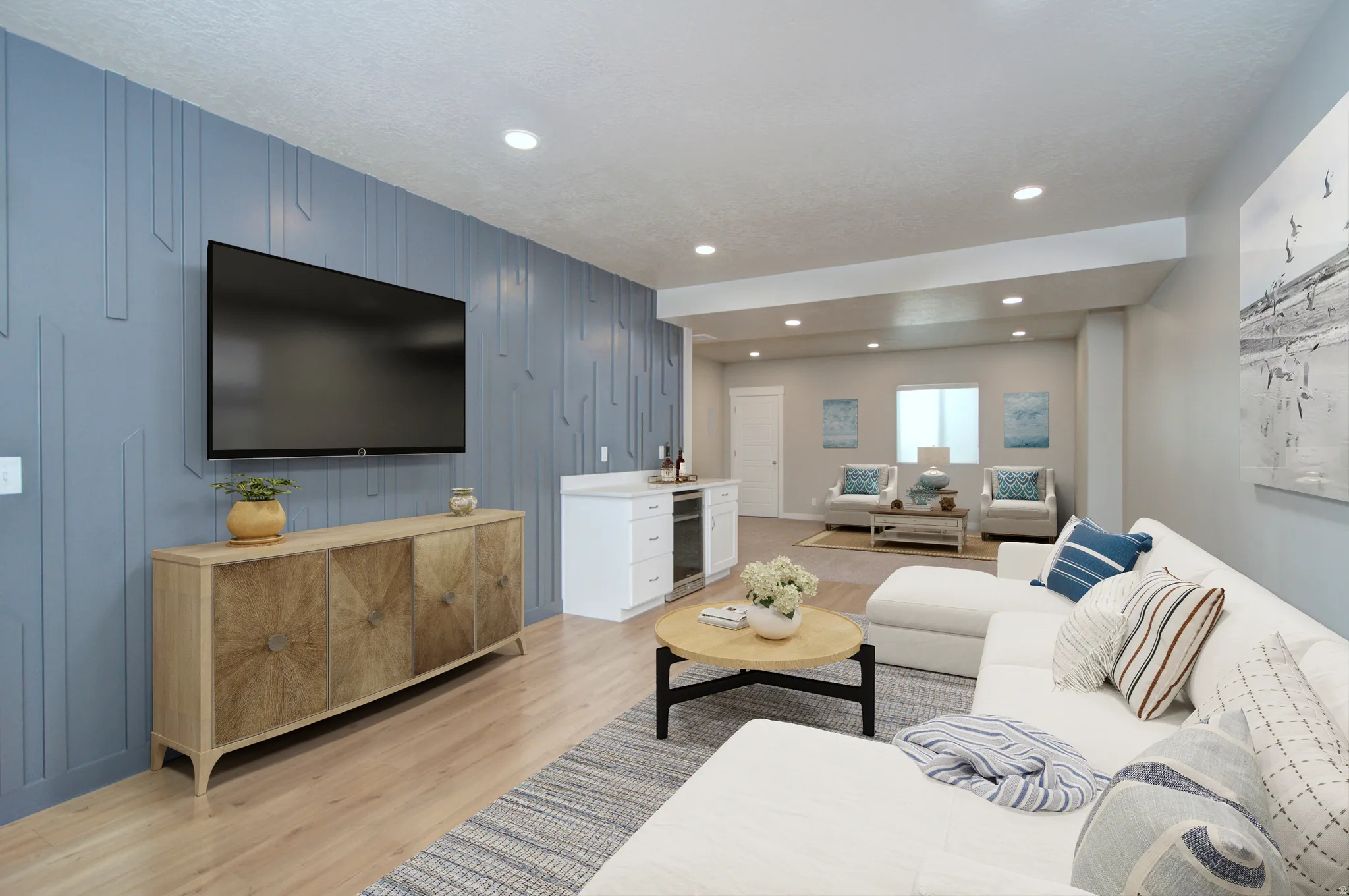Accent wall with vertical paneling and surround sound