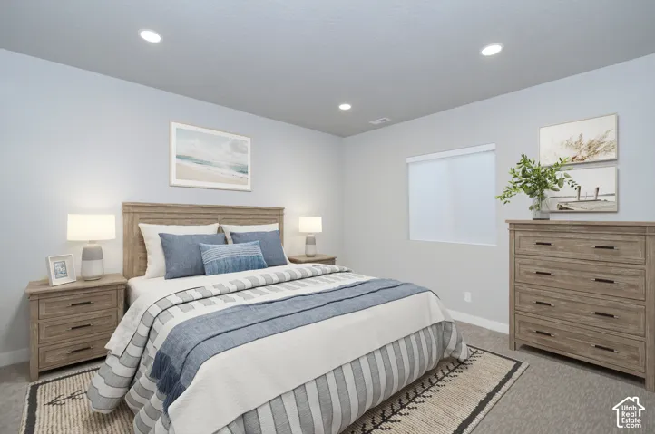 Recessed ceiling lighting illuminates the room