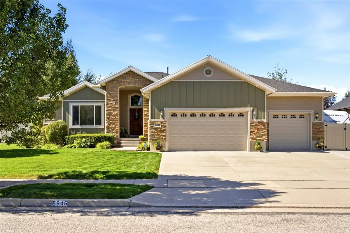 Move-in ready 3,602 square foot rambler in Mountain Green’s premier Cottonwoods community with an attached three-car garage.