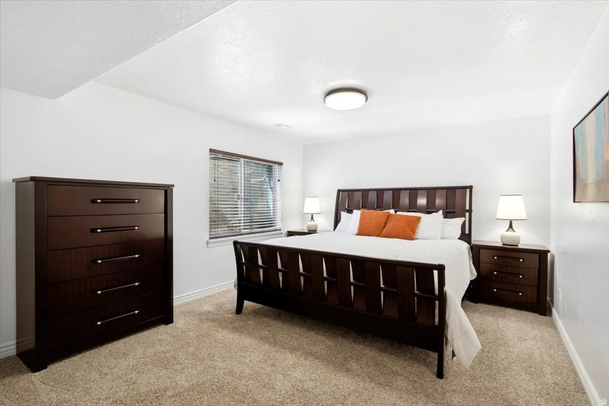 One of the fully finished basement bedrooms offers comfortable additional living space.