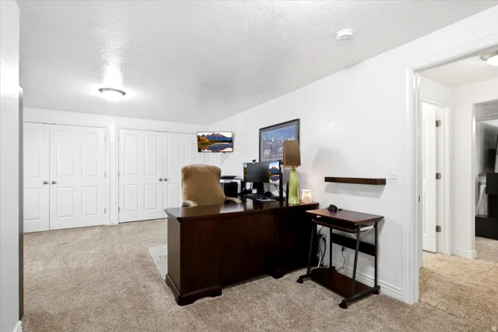 An additional basement gathering area provides flexible space for a home office, hobbies, or recreation.
