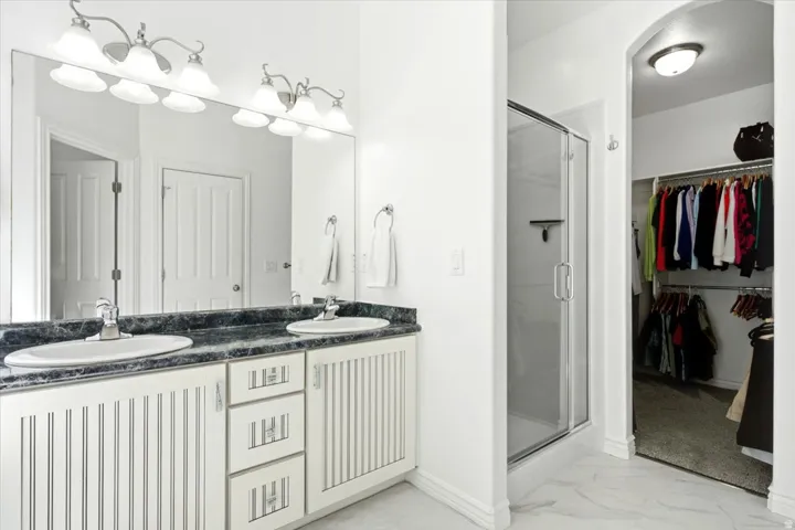 Walk-in closet off the spacious bathroom