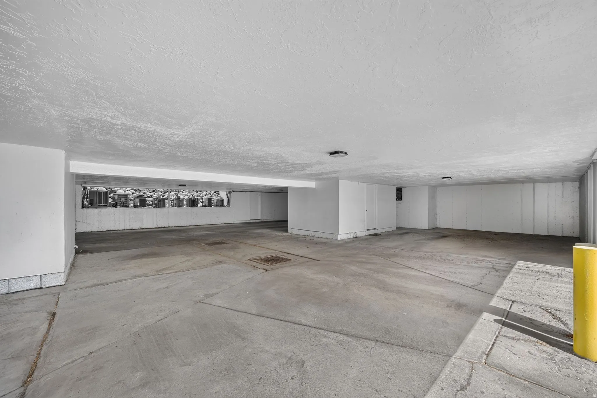 Concrete flooring with ample overhead lighting