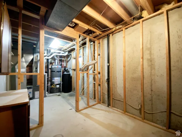 Previous picture Unfinished basement with exposed wood framing, concrete flooring, and visible utility infrastructure