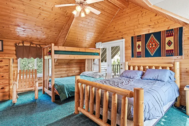Wood-paneled walls and ceiling with a vaulted design