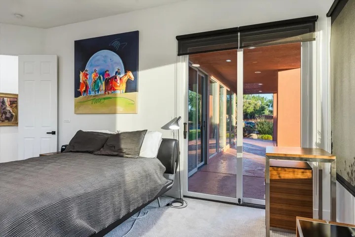 Sliding glass door leading to a covered patio