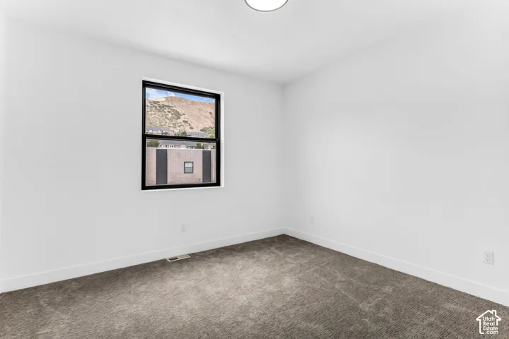 2nd bedroom w/ mountain views and ensuite bathroom