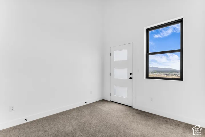 3rd bedroom w/ valley views and walkout to patio. Bedroom has ensuite bathroom