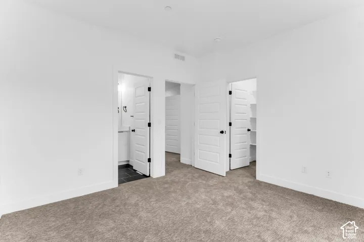 2nd bedroom w/ mountain views and ensuite bathroom
