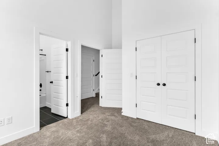 3rd bedroom w/ valley views and walkout to patio. Bedroom has ensuite bathroom