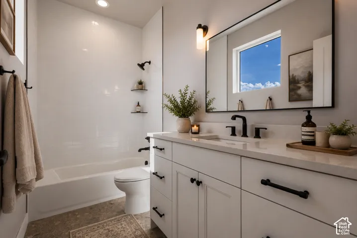 White subway tile shower surround with a built-in tub