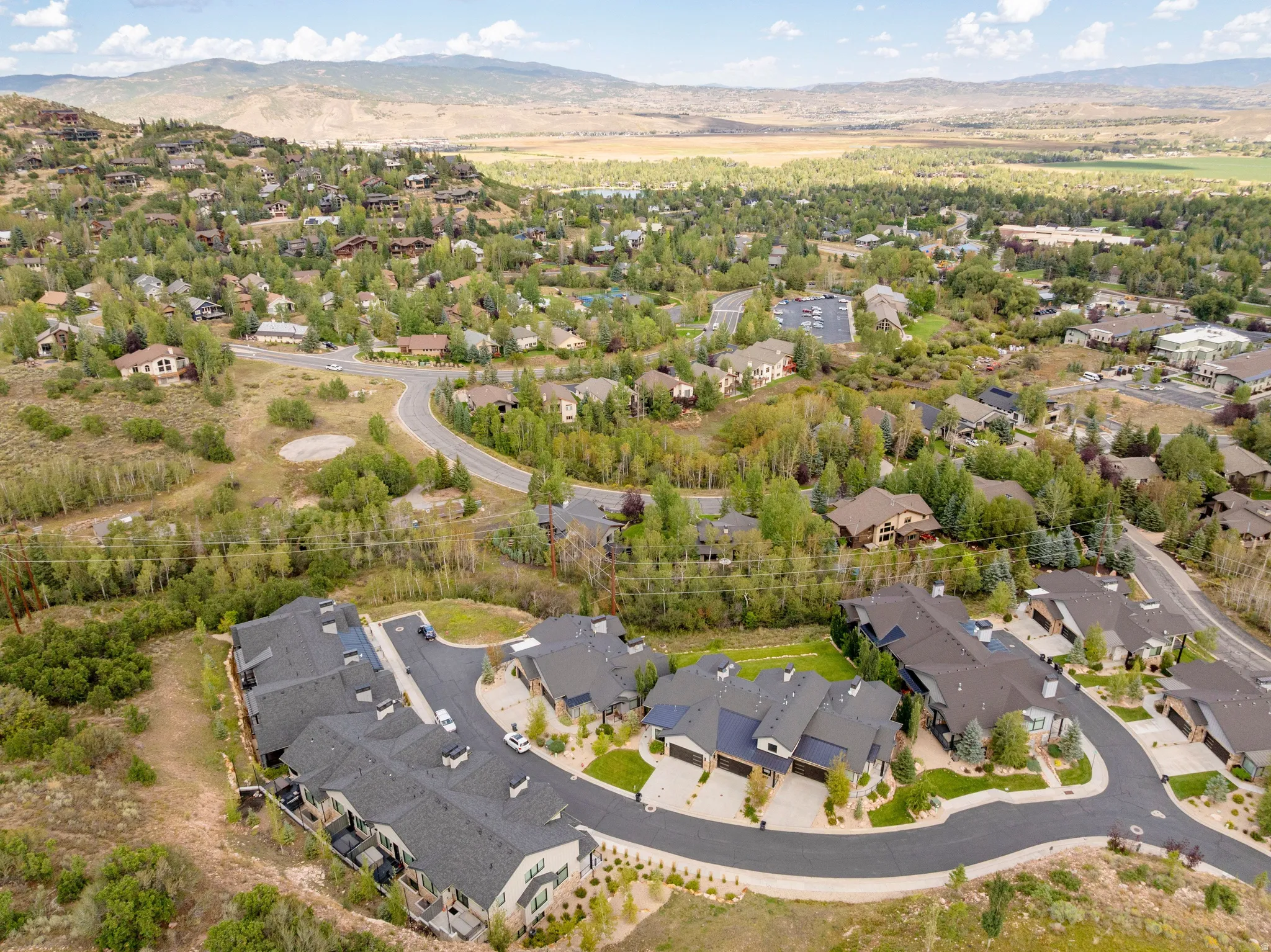 Neighborhood setting with mountainous terrain and established residences