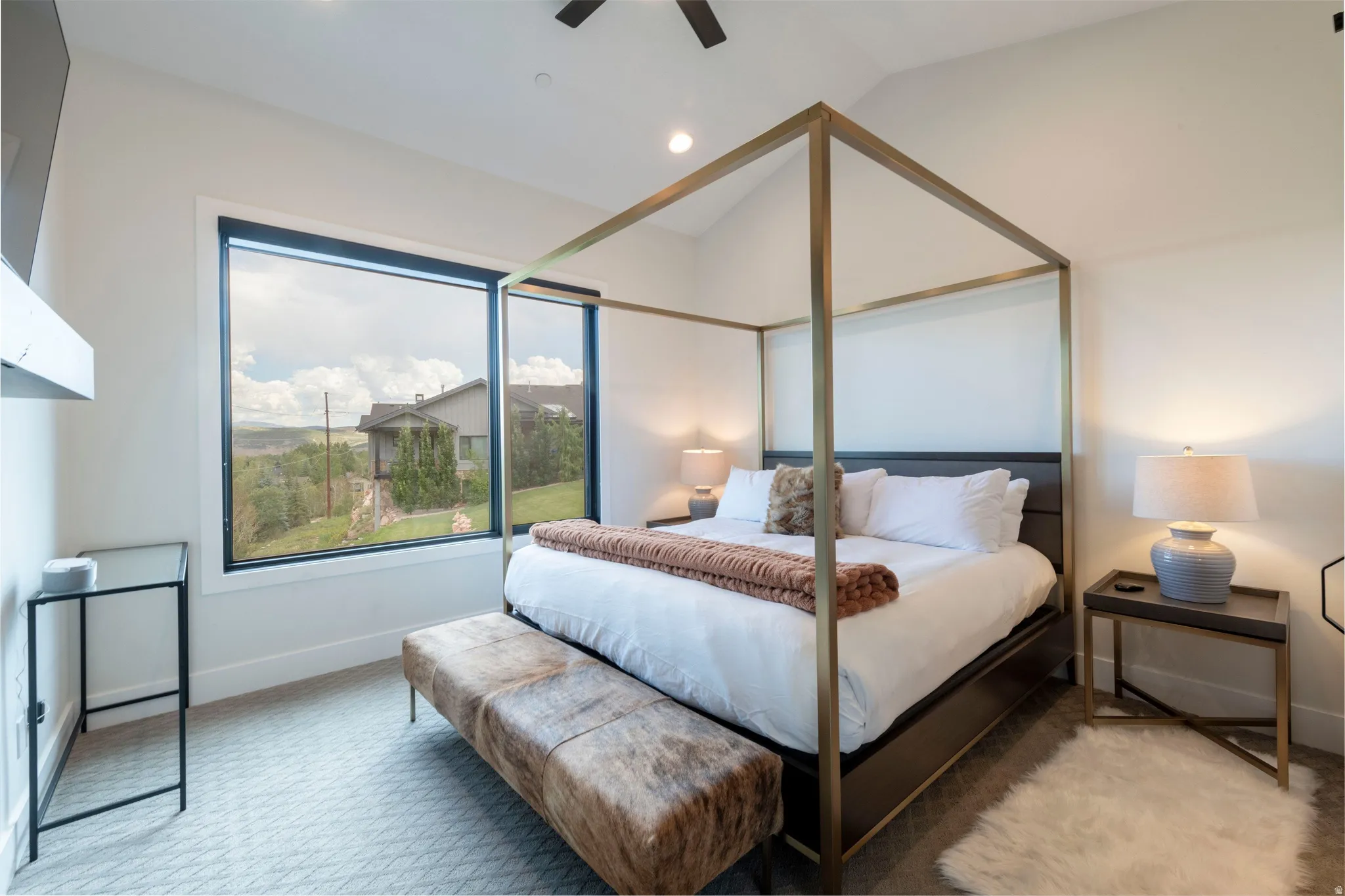 Expansive window wall with mountain scenery