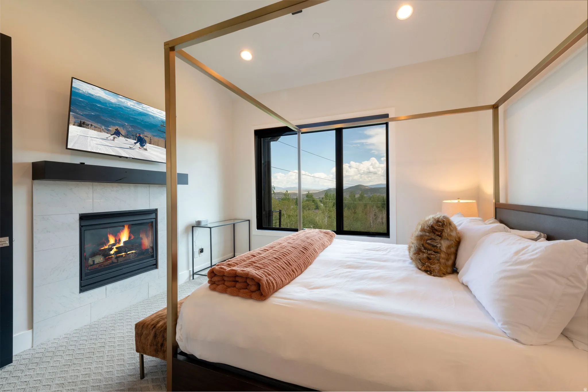 Built-in fireplace with a tile surround and dark wood mantel
