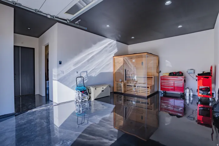 High-gloss reflective flooring, recessed lighting, and a skylight provide ample illumination