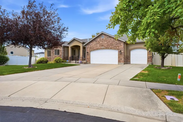 Four car garage and oversized driveway